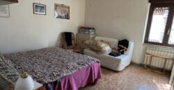 Porzione bifamigliare su due livelli con corte