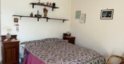 Porzione bifamigliare su due livelli con corte