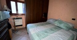 Porzione bifamigliare su due livelli con corte